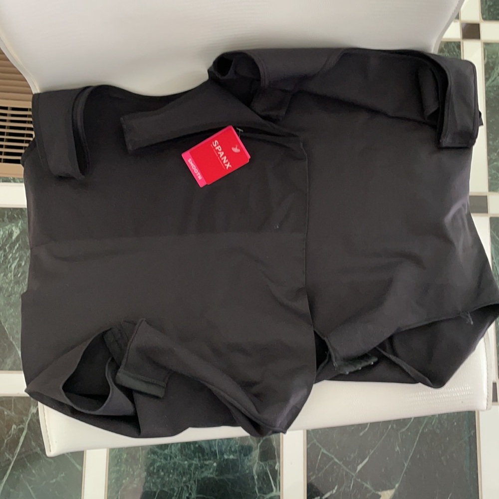 Spank: two The Base Tank Bodysuit. The one without tag has Loose thread on leg.